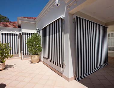 Kenlows black and white striped window awnings and blinds