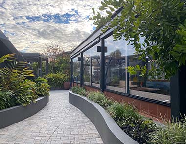 Clear Ziptrak Blinds in outdoor eating area, Westfield Carousel from Kenlow