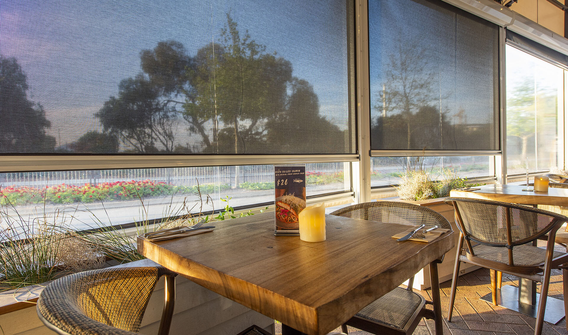 Outdoor cafe area facing table and chairs